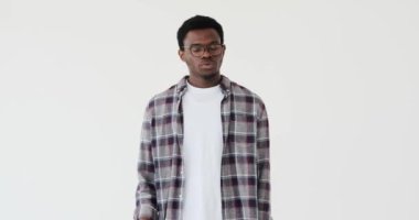 Tired man rubbing his face