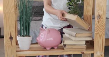 Boy reading a book in bedroom