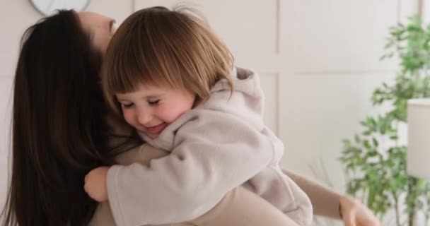 Loving mother and little daughter at home — Stock Video