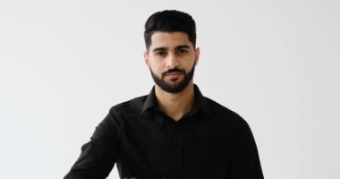 Unhappy businessman giving thumbs down gesture