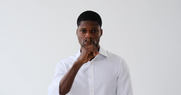 Businessman Gesturing Finger Lips White Background — Stok Video