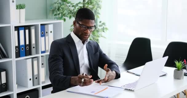 African American Businessman Engaged Online Conference Using Laptop Office — Vídeos de Stock