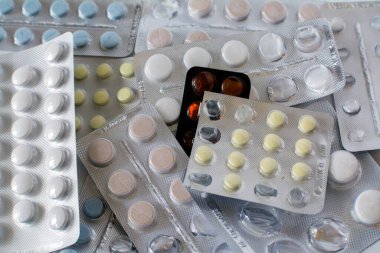 packs of drugs, several different packs of pills