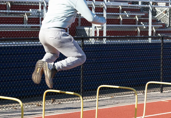 Side View High School Boy Jumping Yellow Two Foot High — Stock Photo, Image
