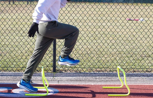 Side View High School Boy Standing Yellow Mini Hurdle Track — Foto Stock