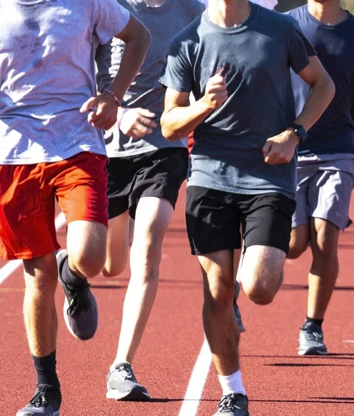 Close Front View High School Boys Running Togeher Track Track — Foto Stock