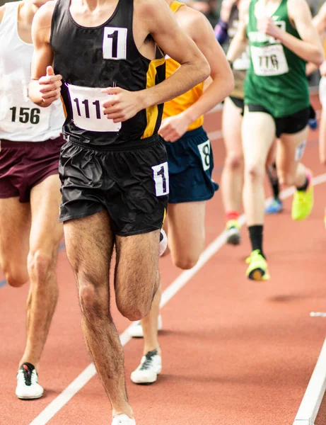 High School Boys Sweating While Running Mile Race Indoor Track — Zdjęcie stockowe