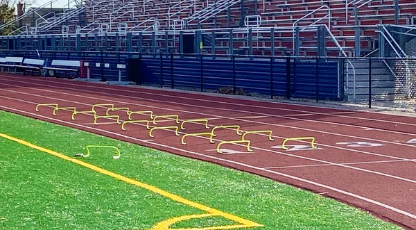 Mini Hurdles Set Front Bleachers Lanes Red Track Runners Run — ストック写真