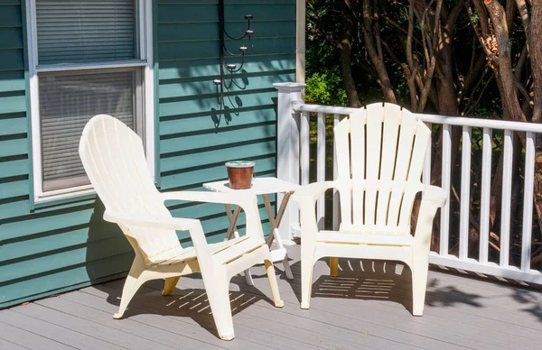 Two Plastic Chairs Cornor New Composite Deck Candles House Small — Stock Photo, Image
