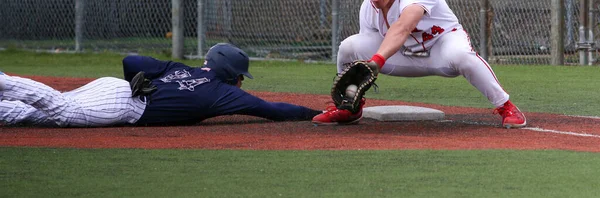 High School Baseball Player Sliding Head Firls Back First Base — Stock Fotó
