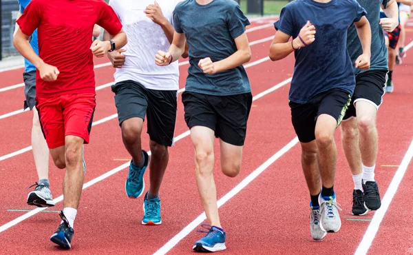 Close Group High School Runners Running Together Track Practice — Stockfoto