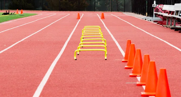 Yellow Mini Hurdles Orange Traffic Cones Set Red Track Athletes — Fotografia de Stock