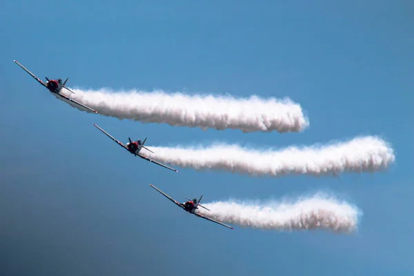 Three of the Skytypers acrobatic airplane performance team perfoming at the Jones Beach Air Show.