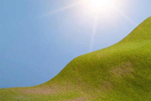 Green hill and sun sky — Stock Photo, Image