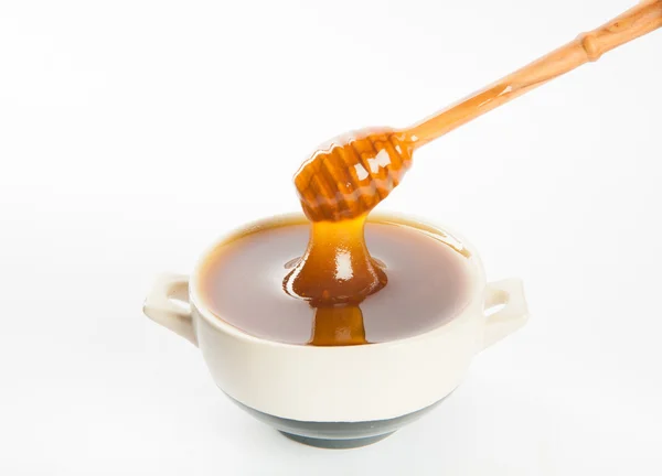 Saftiger Honig in Tasse und Löffel — Stockfoto