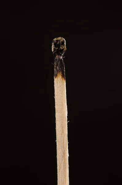 Wooden matches on a black background — Stock Photo, Image