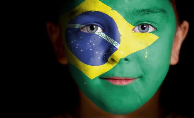 Portrait of a child with a painted flag clipart