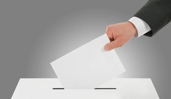 Człowiek rękę w dół głosowanie w urnie Zdjęcie Stockowe