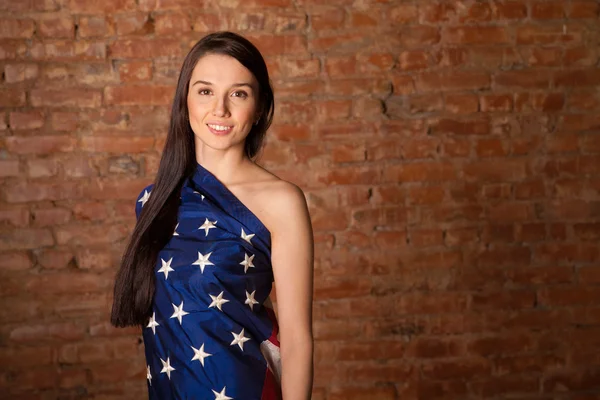 Woman in the American flag — Stock Photo, Image