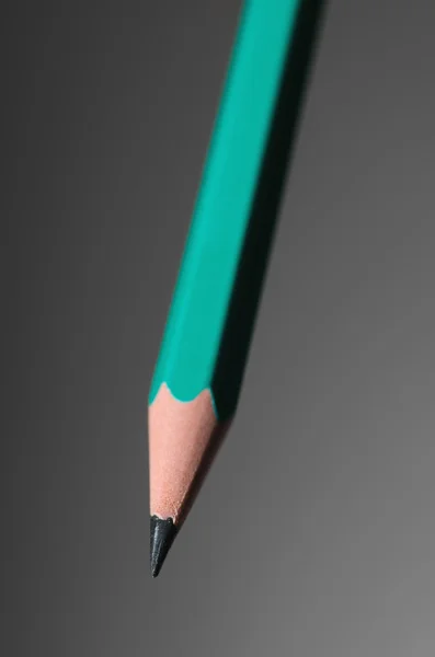 Μολύβι σε γκρι φόντο. — Φωτογραφία Αρχείου