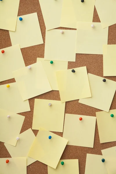 Corkboard and blank paper notes. — Stock Photo, Image