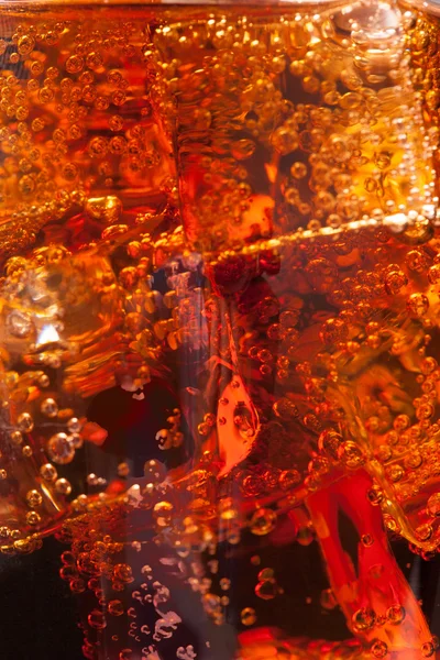 Close up view of the ice cubes in whiskey — Stock Photo, Image