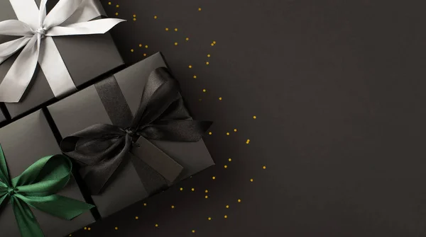 Vue Dessus Trois Boîtes Cadeaux Noires Avec Des Noeuds Ruban — Photo