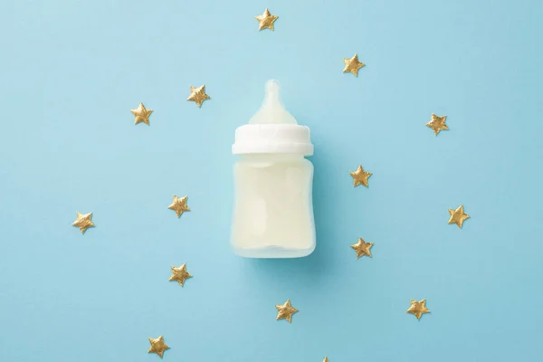 Концепция Детских Принадлежностей Верхний Вид Фото Бутылки Молока Золотые Звезды — стоковое фото