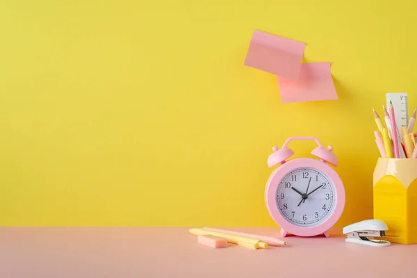 Back School Concept Photo School Supplies Pink Desk Alarm Clock — Stockfoto