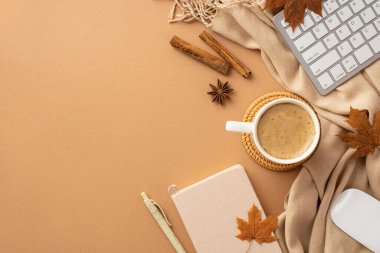 Autumn business concept. Top view photo of cup of frothy drinking rattan placemat planner pen computer mouse keyboard cinnamon sticks anise yellow maple leaves and plaid on isolated beige background
