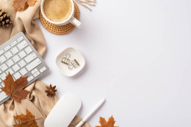 Autumn business concept. Top view photo of keyboard computer mouse cup of coffee rattan placemat binder clips pen fallen maple leaves pine cone anise plaid on isolated white background with copyspace