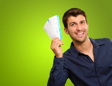 A Young Man Holding Tickets clipart