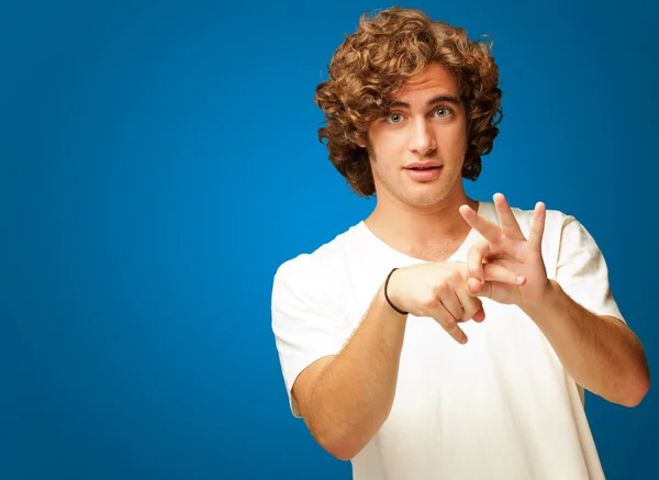 Portrait Of A Man Holding Index Finger — Stock Photo, Image