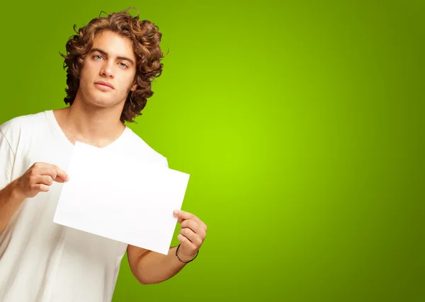Young Casual Man Holding A Blank Message — Stok Foto