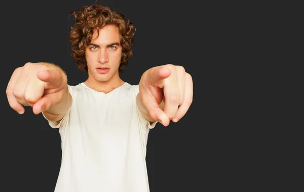 Portrait Of Young Man Pointing With Hand — Stock Photo, Image