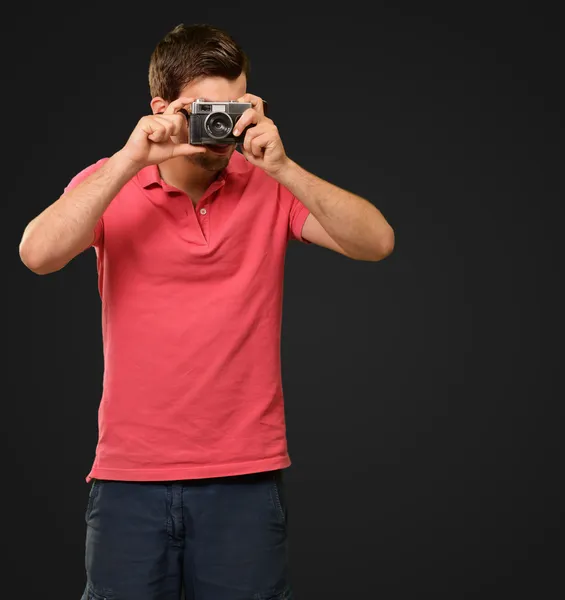 Portrait of a man taking photo — Stock Photo, Image