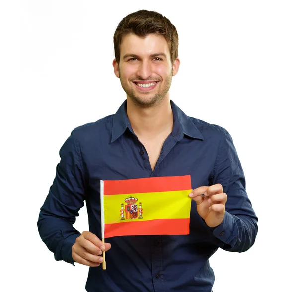 Um jovem segurando uma bandeira da Espanha — Fotografia de Stock