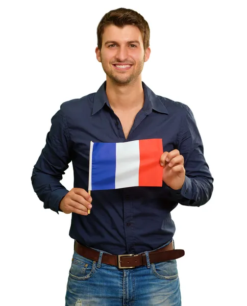 Un jeune homme tenant un drapeau de France — Photo