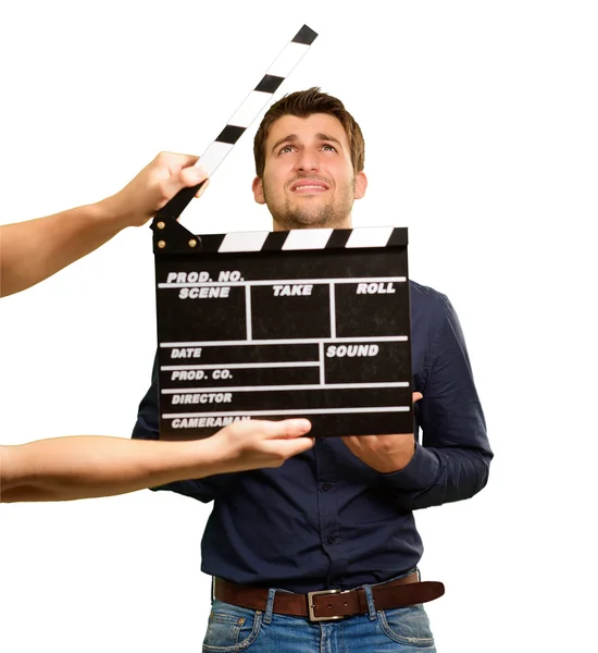 A Young Man Holding A Clapboard And Acting — Stock Photo, Image