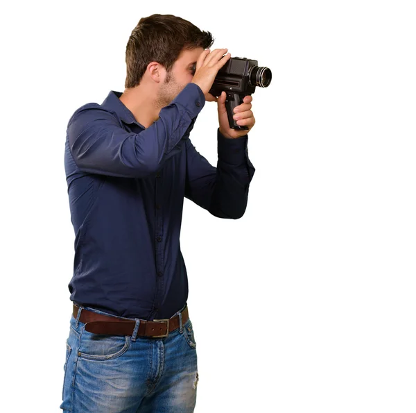 Joven hombre sosteniendo viejo cámara — Foto de Stock