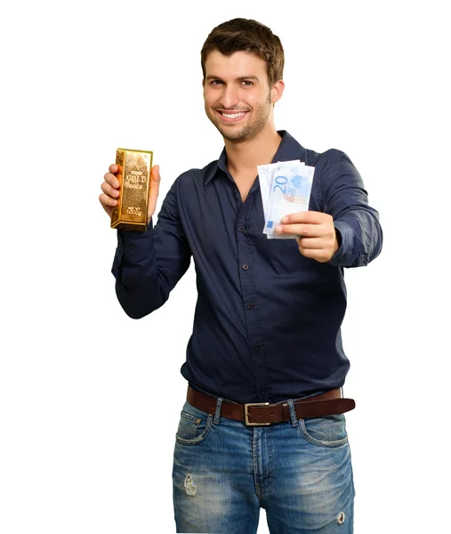 Young Man Holding Currency And Gold Bar — Stock Photo, Image