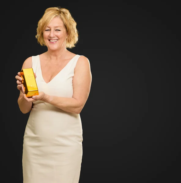 Happy Woman Holding Gold Bar — Stock Photo, Image