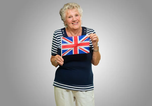 Woman Holding Bandera del Reino Unido —  Fotos de Stock