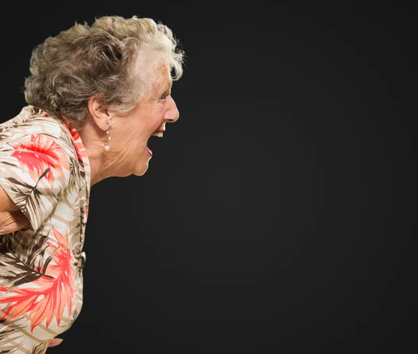 Крики пожилой женщины — стоковое фото