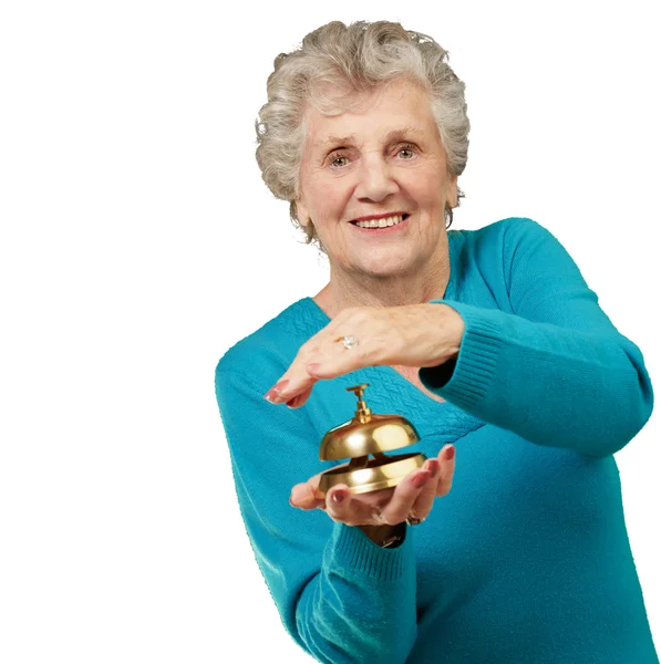 Feliz mujer madura mientras sostiene la campana —  Fotos de Stock