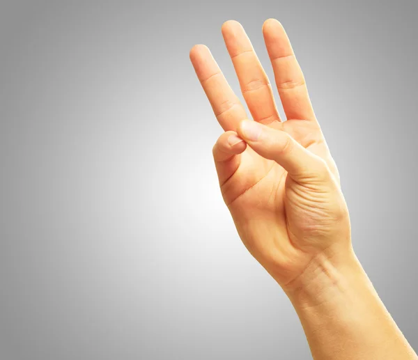 Mano humana con dos dedos apuntando hacia arriba —  Fotos de Stock