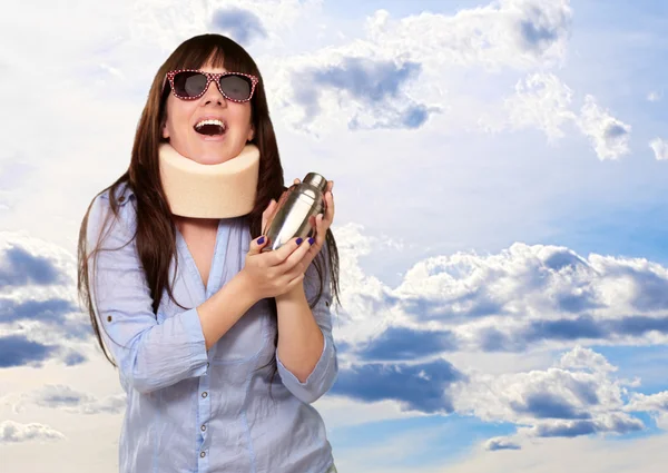 Woman Wearing Neckbrace Holding A Shaker — Stock Photo, Image