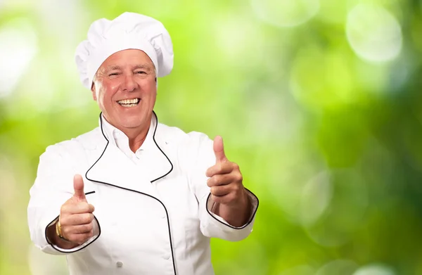 Retrato de um cozinheiro Chef com sinal de mão — Fotografia de Stock