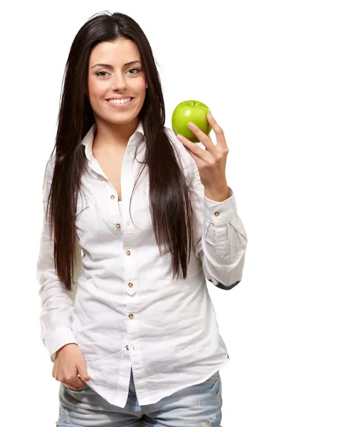 Mujer mostrando verde manzana — Foto de Stock