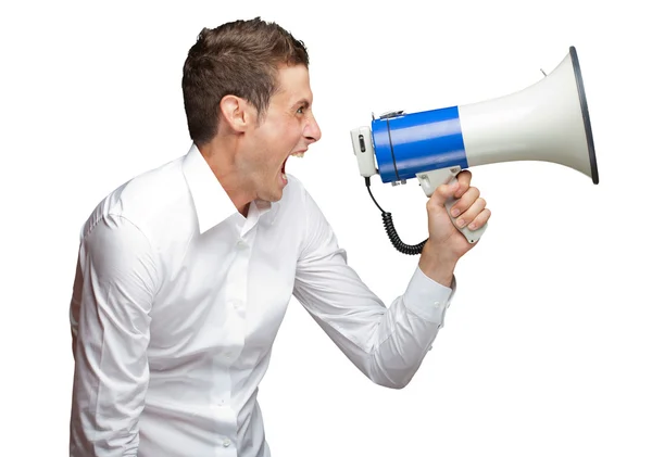 Portrait Of Young Man Shouting On Megaphone Stock Picture